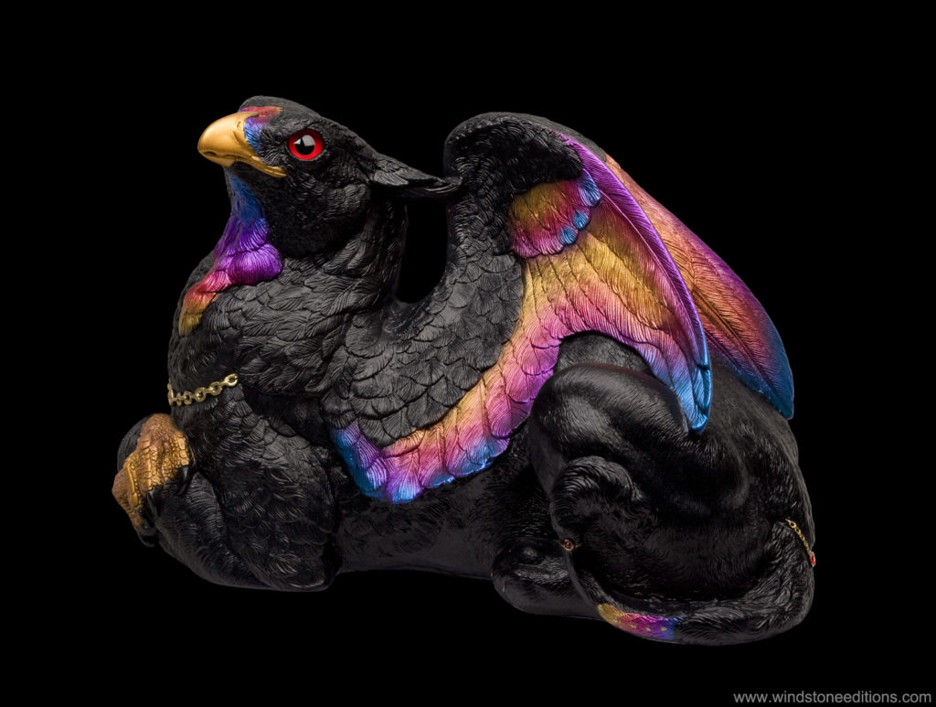 Black Sunset Female Griffin with flame-colored accents, red eyes, and red crystal jewels in her gold collar and tail. Hand-painted collectible sculpture by Windstone Editions.