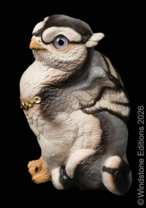 Sitting Griffin Chick fantasy figurine. Hand-painted collectable sculpture by Windstone Editions painted in a silver wolf pattern