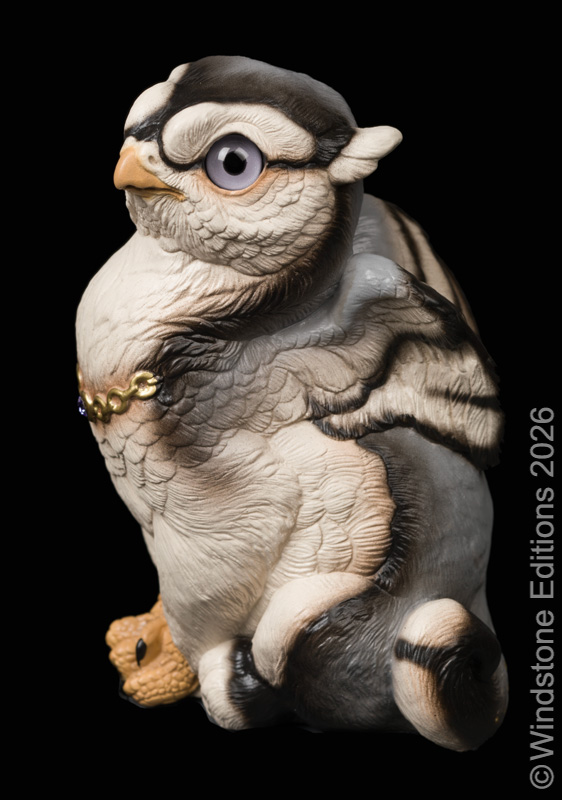 Sitting Griffin Chick fantasy figurine. Hand-painted collectable sculpture by Windstone Editions painted in a silver wolf pattern