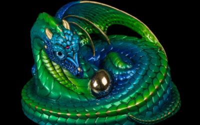 Mother Coiled Dragon fantasy figurine in Emerald-Peacock with blue eyes, an amethyst-colored jewel, and a gold-plated pewter egg. Hand-painted collectible by Windstone Editions