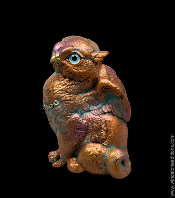 Sitting Griffin Chick in copper patina with teal eyes and blue zircon jewels. Hand-painted collectible sculpture by Windstone Editions