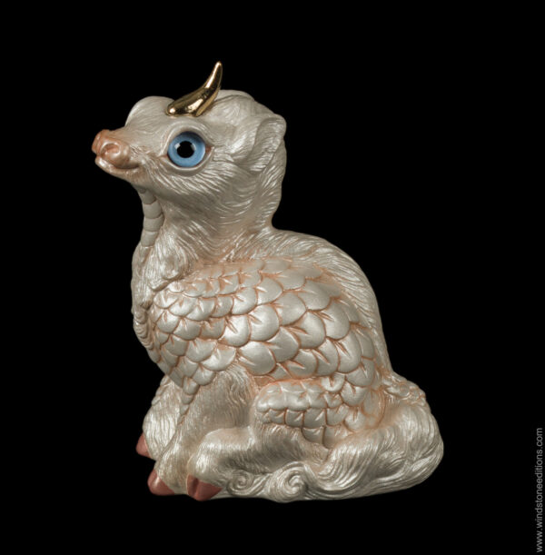 Baby Albino Ki-Rin fantasy figurine with light blue eyes, pearly white scales, and a gold-plated pewter horn. Hand-painted collectible by Windstone Editions.