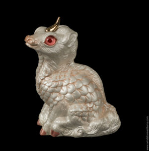 Baby Albino Ki-Rin fantasy figurine with pink-coral eyes, pearly white scales, and a gold-plated pewter horn. Hand-painted collectible by Windstone Editions.