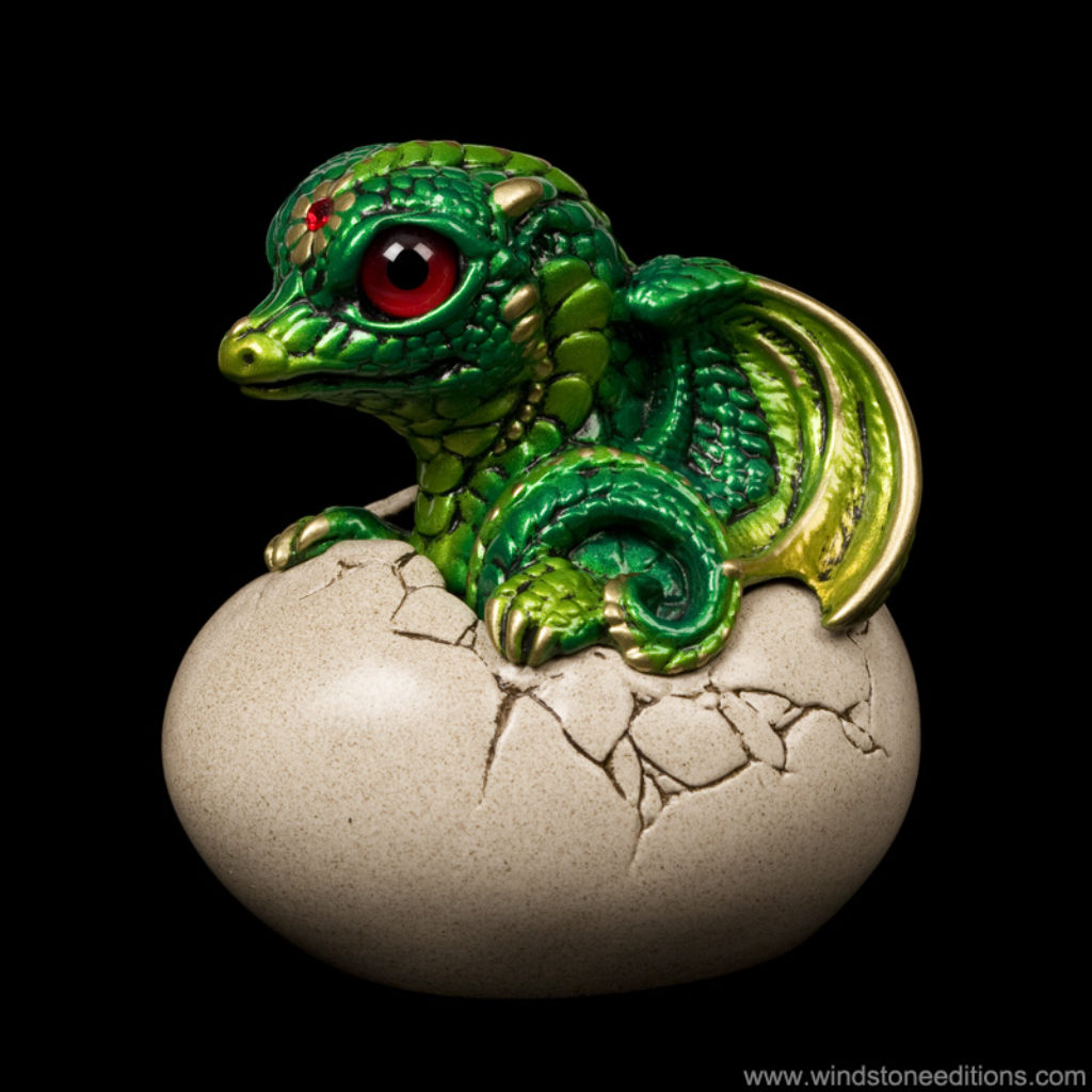 Hatching Dragon version two fantasy figurine in Emerald with red glass eyes and a red-colored jewel. Hand-painted collectible by Windstone Editions.