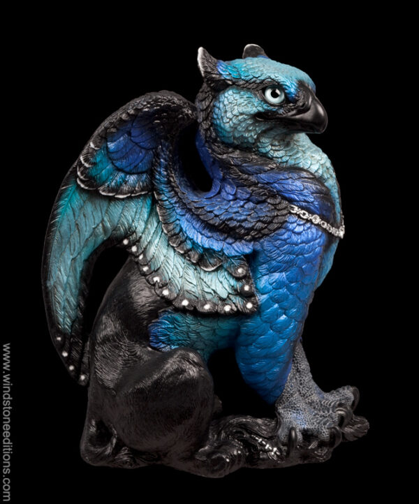 Male Griffin fantasy figurine with blue morpho butterfly colors. Hand-painted collectible sculpture by Windstone Editions