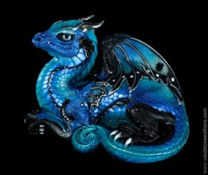 Old Warrior Dragon fantasy figurine in Blue Morpho with metallic blue shades, black trim, and silver-colored pewter horns. Hand-painted collectible sculpture by Windstone Editions