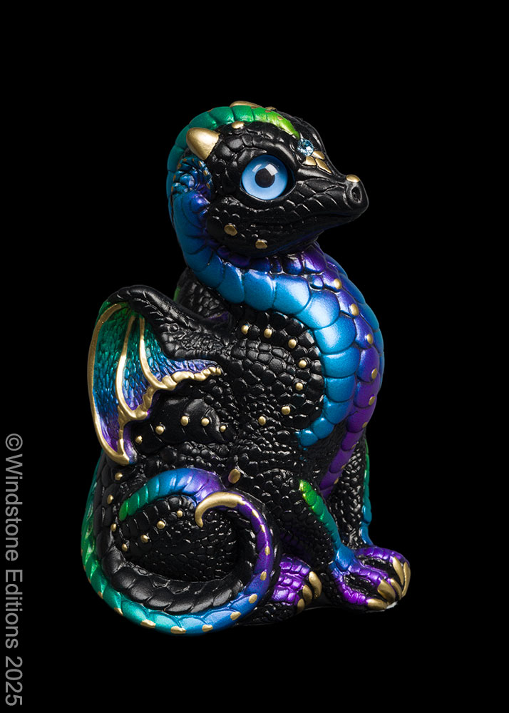Baby Dragon fantasy figurine. Hand-painted collectable sculpture by Windstone Editions in black, violet, blue, and green.