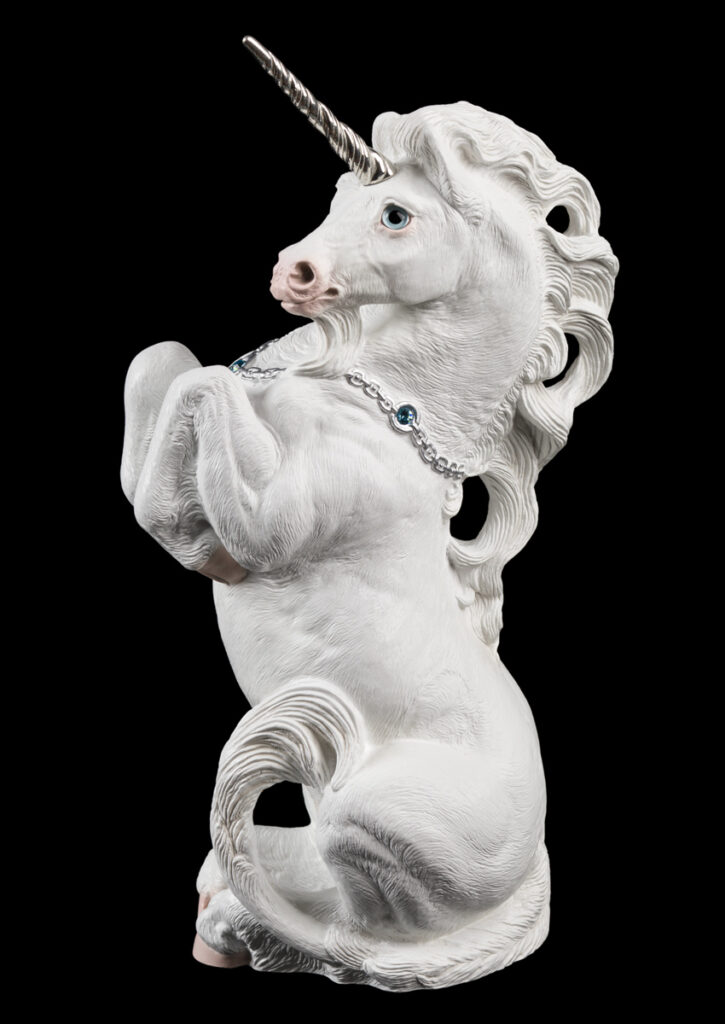 Male Unicorn fantasy figurine in show white with silver details and blue eyes. Hand-painted collectible sculpture by Windstone Editions