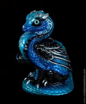 Mini Keeper Dragon fantasy figurine in Blue Morpho with blue shading, black striping, silver trim, light metallic teal glass eyes, and clear-colored crystal jewels. Hand-painted collectible sculpture by Windstone Editions.