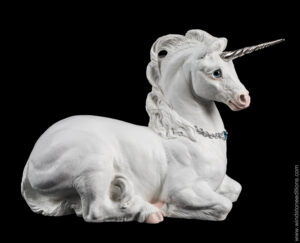 Mother Unicorn fantasy figurine in snow white with silver details. Hand-painted collectible sculpture by Windstone Editions