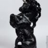 Male Unicorn fantasy figurine in jet black with silver details. Hand-painted collectible sculpture by Windstone Editions