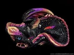 Mother Dragon fantasy figurine in Black Gold with ruby red, metallic violet, and metallic gold trim, blue glass eyes, and amethyst-colored jewels. Hand-painted collectible by Windstone Editions.