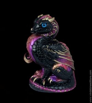 Mini Keeper Dragon fantasy figurine in Black Gold with blue glass eyes and amethyst-colored jewels. Hand-painted collectible by Windstone Editions.