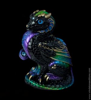 Mini Keeper Dragon fantasy figurine in Black Violet Peacock with emerald and jade green, blue, and violet accents, blue glass eyes, and light blue-colored jewels. Hand-painted collectible by Windstone Editions