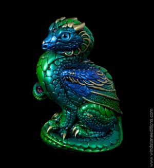 Mini Keeper Dragon fantasy figurine in Emerald Peacock with blue glass eyes and amethyst-colored jewels. Hand-painted collectible by Windstone Editions.