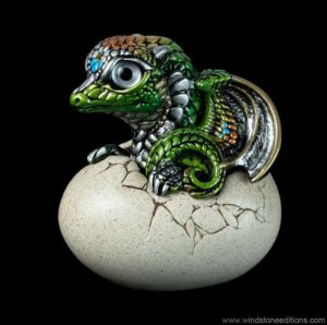 Hatching Dragon version two fantasy figurine in Elven with green and copper accents, silver wing webs, metallic silver eyes, and jonquil-colored jewel. Hand-painted collectible by Windstone Editions.