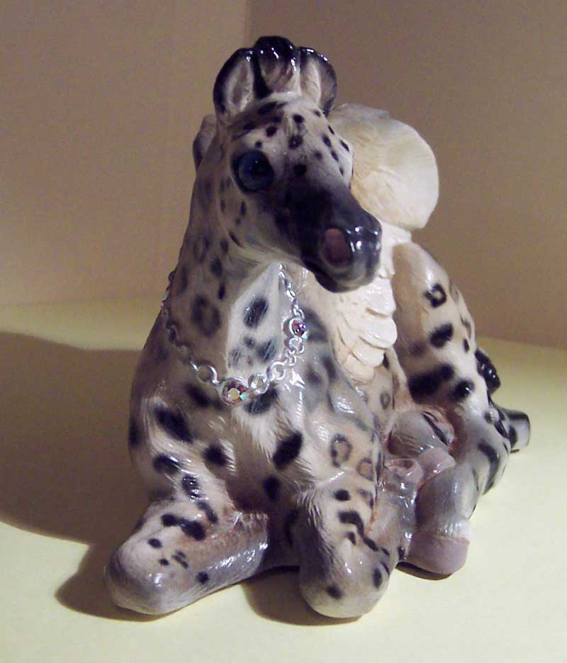 Pegasus_baby_GB-snow-leopard_front_800-wide