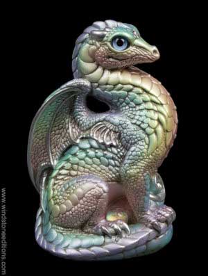 Bantam Dragon fantasy figurine in Pastel Rainbow with silver detailing, light blue glass eyes, clear crystal jewels, and dichroic crystal globe. Hand-painted collectible by Windstone Editions.