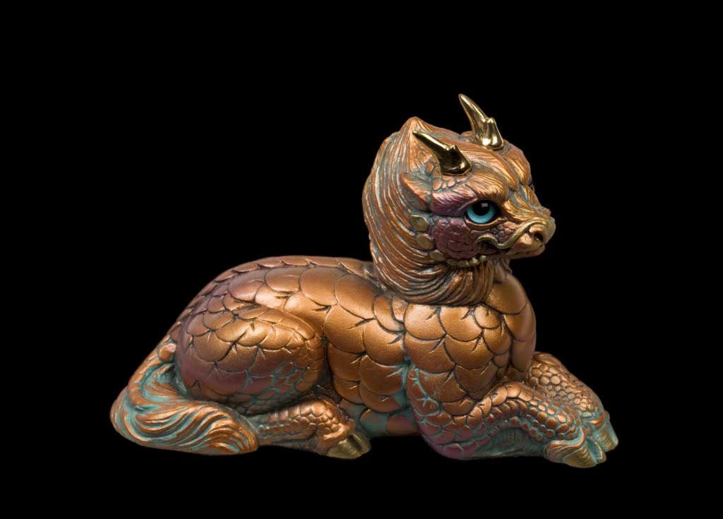 Young Qi-Lin in copper patina with aqua glass eyes and gold-plated pewter antlers. Hand-painted collectible by Windstone Editions