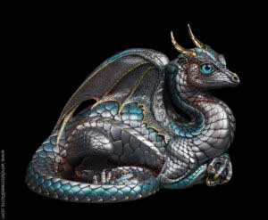 Lap Dragon fantasy figurine in Ancient Steel with polished silver and blue scales, gold-plated pewter horns, teal glass eyes, and aquamarine-colored jewels. Hand-painted collectible by Windstone Editions.