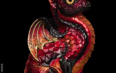 Fledgling Dragon fantasy figurine in Brimstone with fiery red, gold, and black markings, metallic tan eyes, and golden jewels. Hand-painted collectible by Windstone Editions.