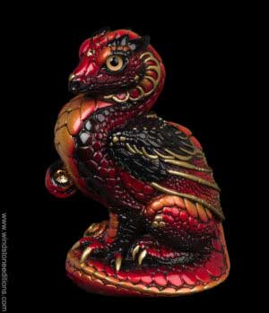 Mini Keeper Dragon fantasy figurine in Brimstone with fiery red, gold, and black markings, metallic tan eyes, and golden-colored jewels. Hand-painted collectible sculpture by Windstone Editions.