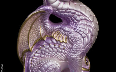 Bantam Dragon fantasy figurine in Lavender Pearl with gold detailing, metallic lavender glass eyes, amethyst-colored jewels, and a dichroic crystal globe. Hand-painted collectible by Windstone Editions.