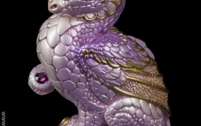 Mini Keeper Dragon in Lavender Pearl with metallic lavender glass eyes, amethyst-colored jewels, and gold detailing. Hand-painted collectible by Windstone Editions