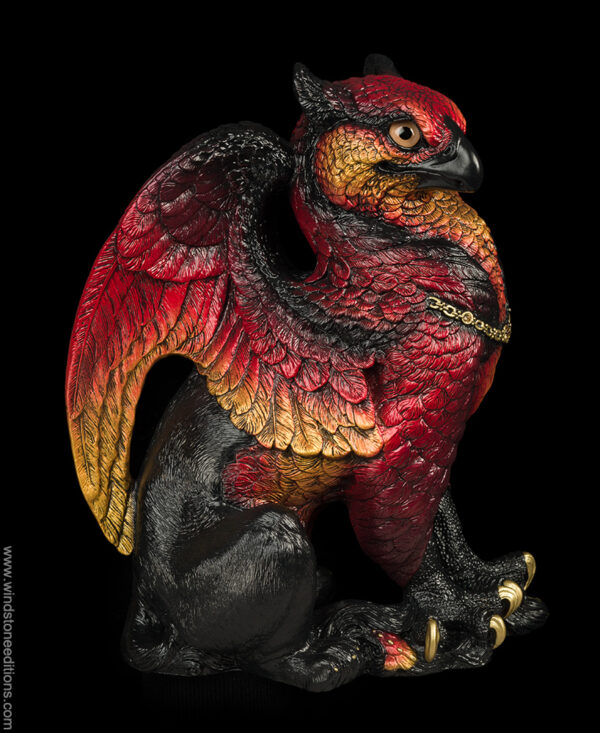 Male Griffin Brimstone fantasy figurine with red and gold wings and black haunches. Hand-painted collectible sculpture by Windstone Editions