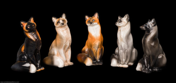 Pebble Sitting Grey Fox fantasy figurine. Hand-painted collectable sculpture by Windstone Editions.