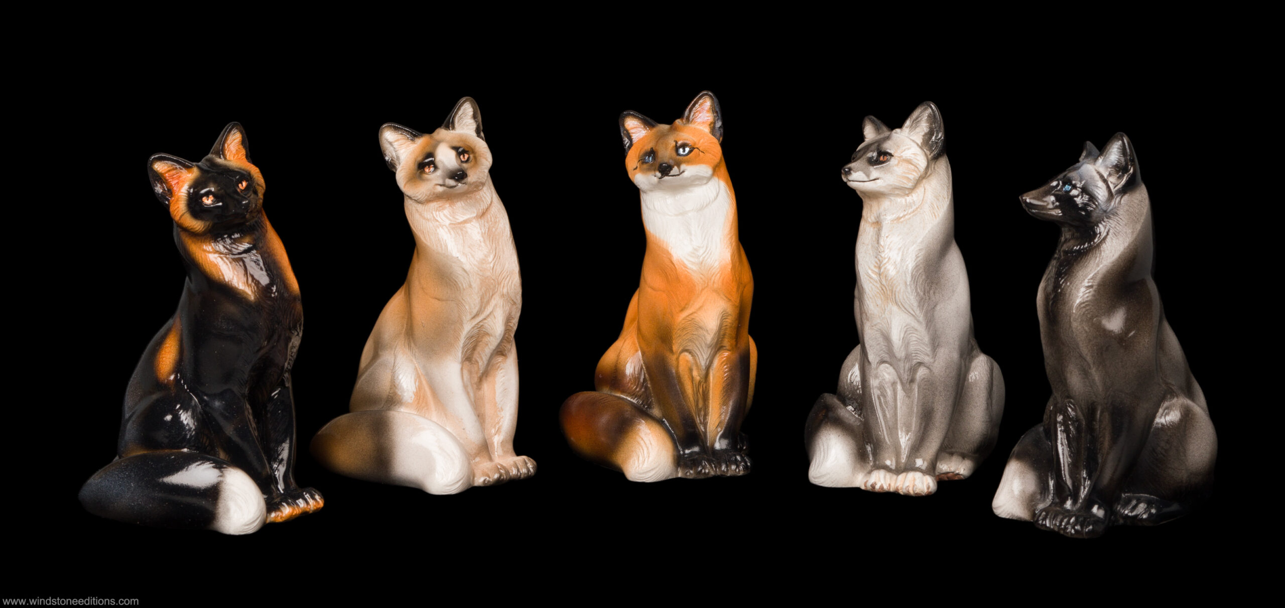 Pebble Sitting Grey Fox fantasy figurine. Hand-painted collectable sculpture by Windstone Editions.