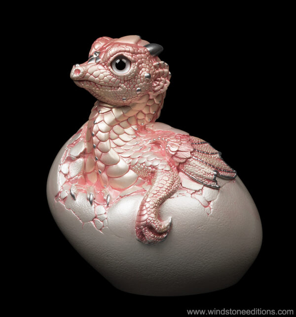 Hatching Empress Dragon fantasy figurine. Hand-painted collectable sculpture by Windstone Editions in shell pink.