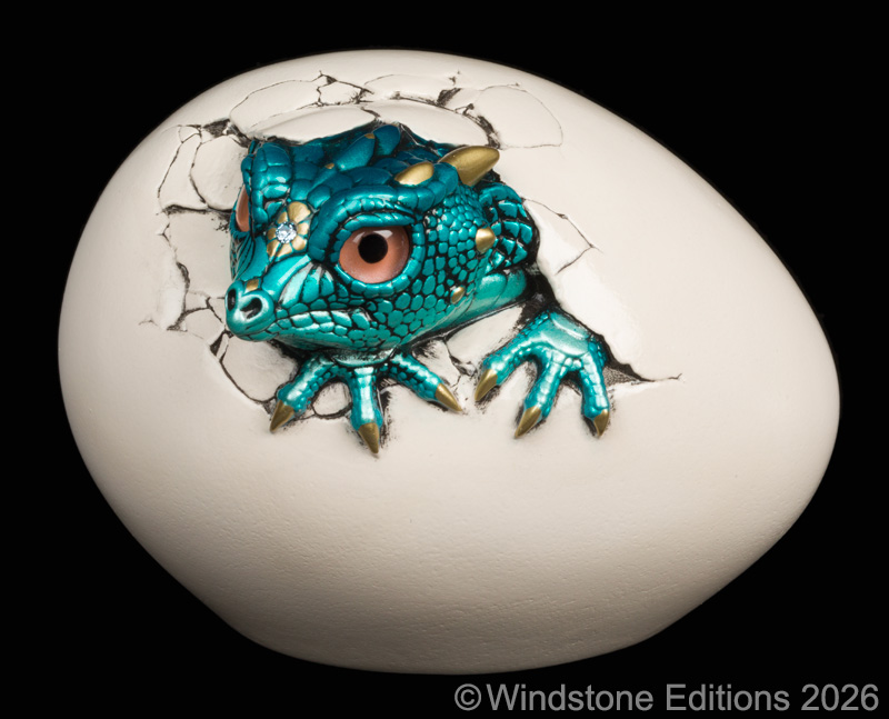 Hatching Kinglet Dragon fantasy figurine. Hand-painted collectable sculpture by Windstone Editions painted in shades of teal and copper.