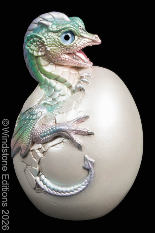 Hatching Emperor Dragon fantasy figurine. Hand-painted collectable sculpture by Windstone Editions in pastel rainbow