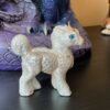Standing albino baby kirin - Blue eyes