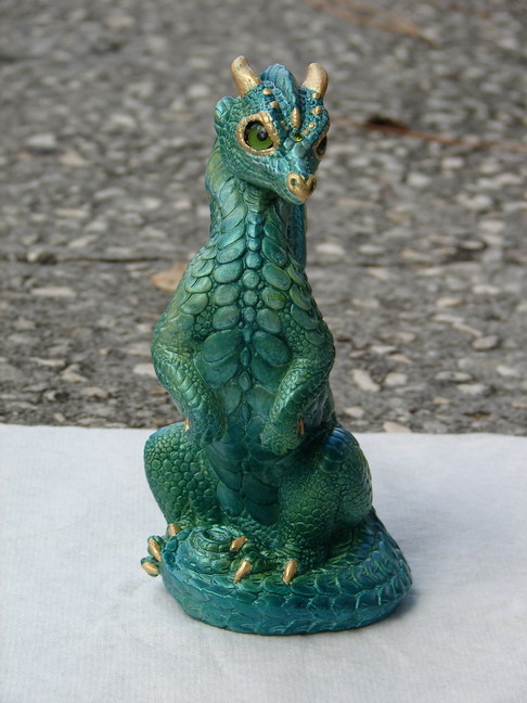 Green Metal Dragon from the front. 